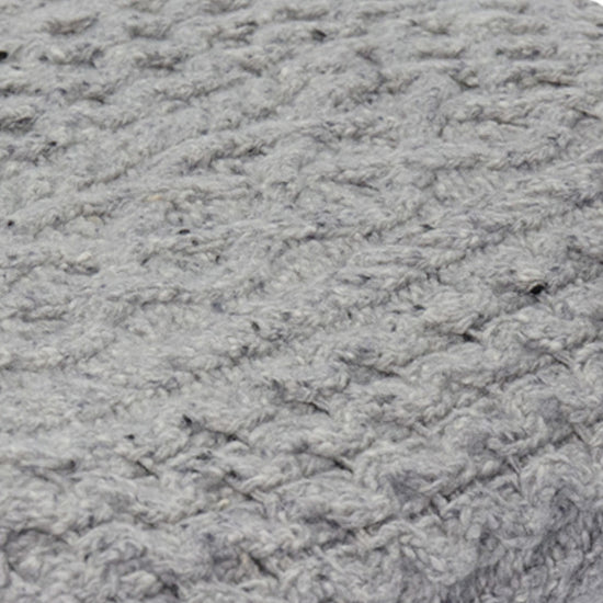 
                  
                    Strickdecke mit Zopfmuster
                  
                