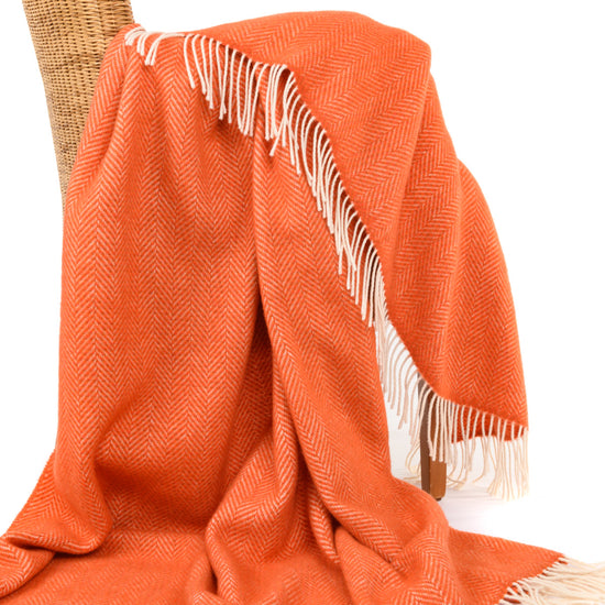 
                  
                    "Die Orange" - weiche Merino-/Kaschmirdecke
                  
                