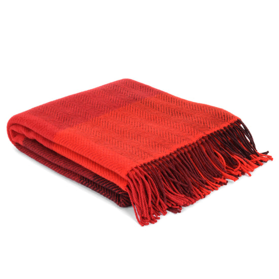 
                  
                    "Shades of Red" – weiche Wolldecke mit Kaschmir
                  
                