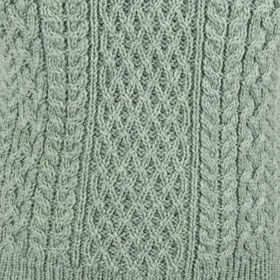 
                  
                    Kurzer Pullunder mit Zopfmuster
                  
                