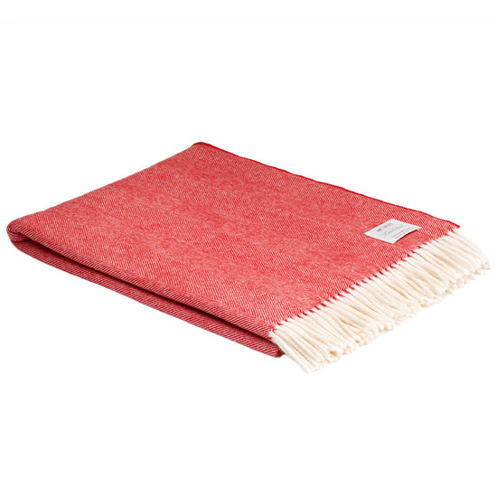 
                  
                    Wolldecke in feinem Fischgrätmuster
                  
                