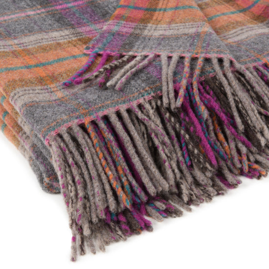 
                  
                    Buntes Lammwollplaid "Classico"
                  
                