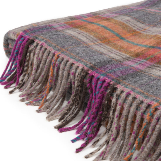 
                  
                    Buntes Lammwollplaid "Classico"
                  
                