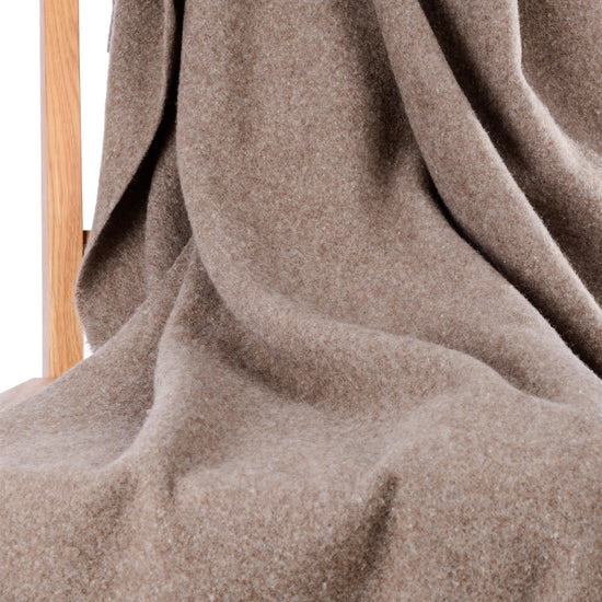 
                  
                    Lammwollplaid "GOBI"
                  
                